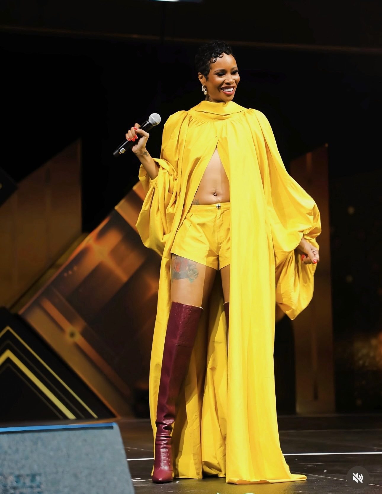 On stage, in gold.